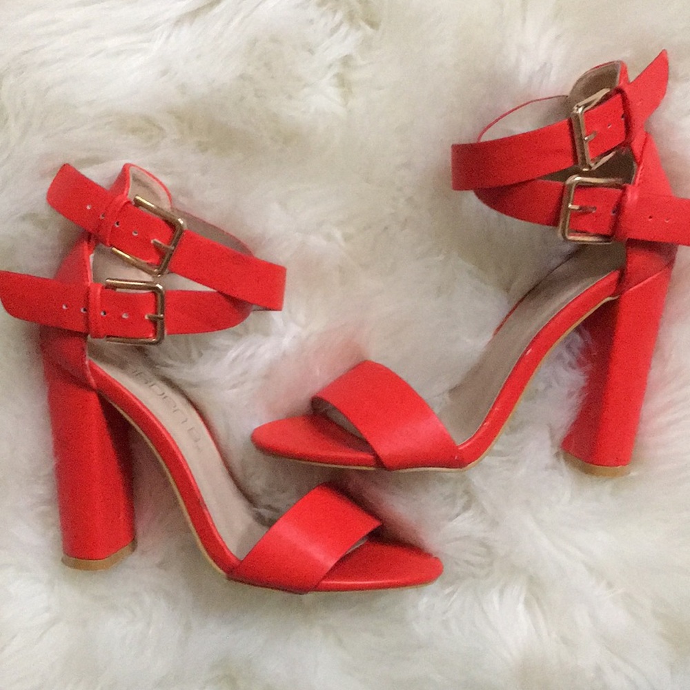 Red strap heels
